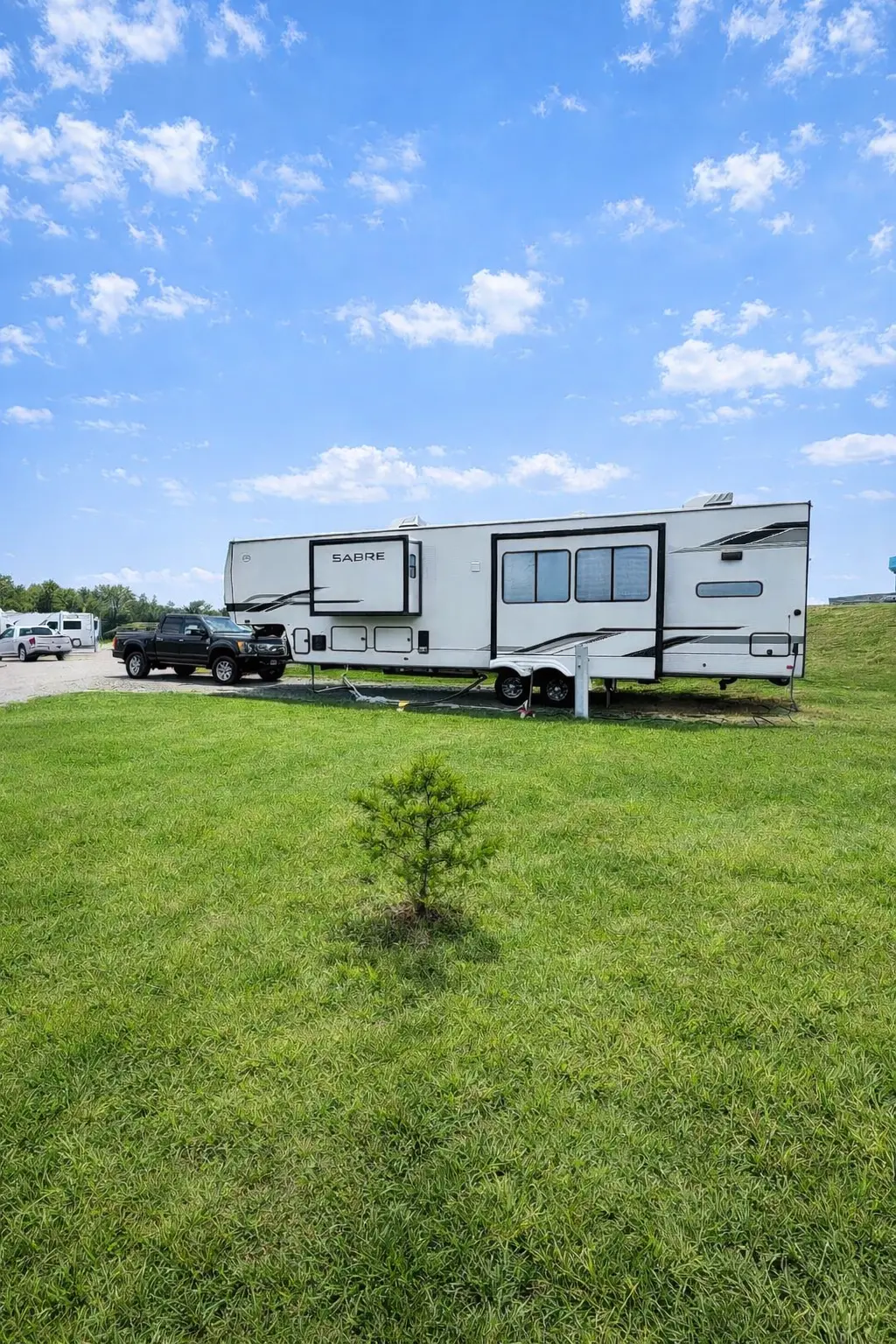Back-in full-hookup RV site with 30/50 amp service at Alta Campground